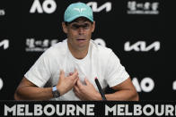 Spain's Rafael Nadal gestures during a press conference ahead of the Australian Open tennis championships in Melbourne, Australia, Saturday, Jan. 15, 2022. (AP Photo/Simon Baker)