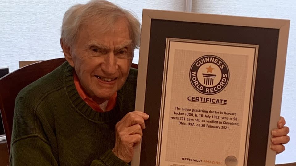 Howard Tucker shows off his Guiness World Record certificate designating him the "oldest practicing doctor." - Courtesy Dr. Howard Tucker