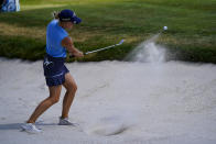 Alana Uriell hits out of the trap on the seventh hole during the first round of the ShopRite LPGA Classic golf tournament, Friday, June 10, 2022, in Galloway, N.J. (AP Photo/Matt Rourke)
