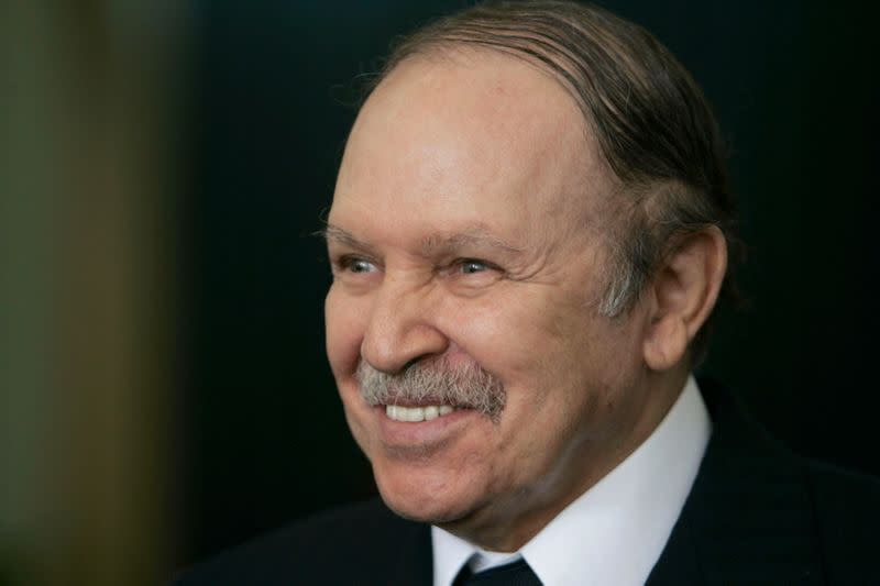 FILE PHOTO: Algeria's President Abdelazziz Bouteflika smiles at the presidential palace in Algiers