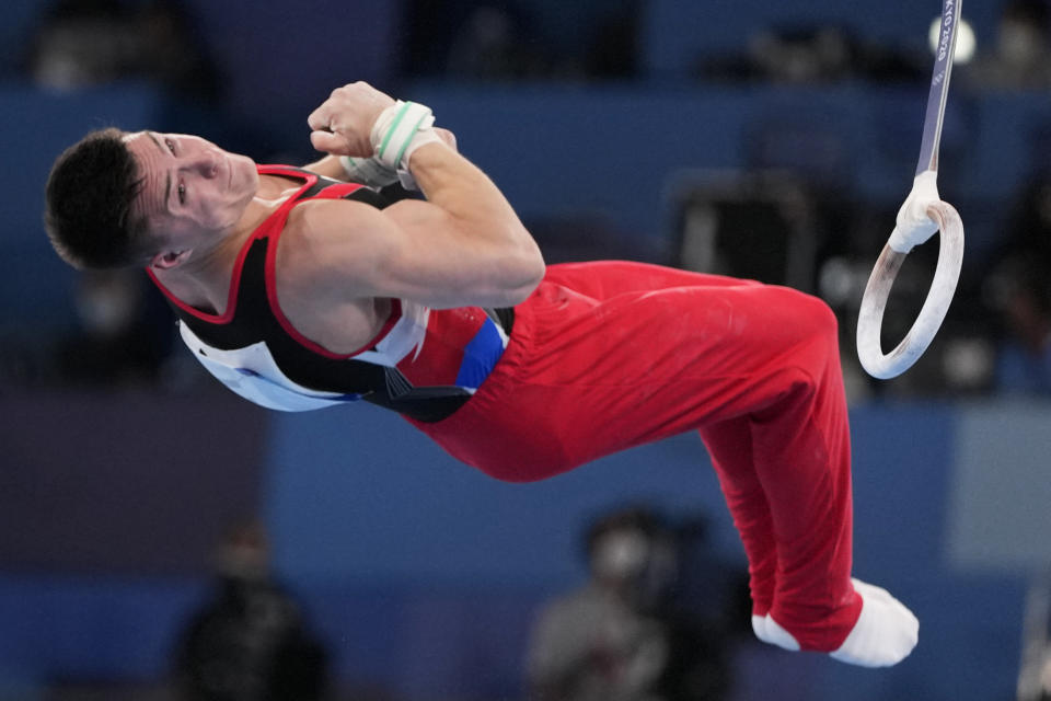 The Russian Olympic Committee's Nikita Nagornyy performs on the rings during men's artistic gymnastic qualifications at the 2020 Summer Olympics, Saturday, July 24, 2021, in Tokyo. (AP Photo/Natacha Pisarenko)