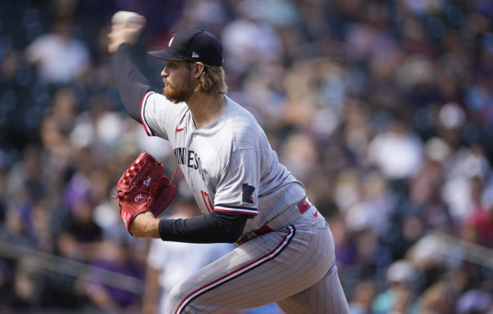 Minnesota Twins starting pitcher Bailey Ober works against the Colorado Rockies in the first inning of a baseball game, Sunday, Oct. 1, 2023, in Denver. (AP Photo/David Zalubowski)