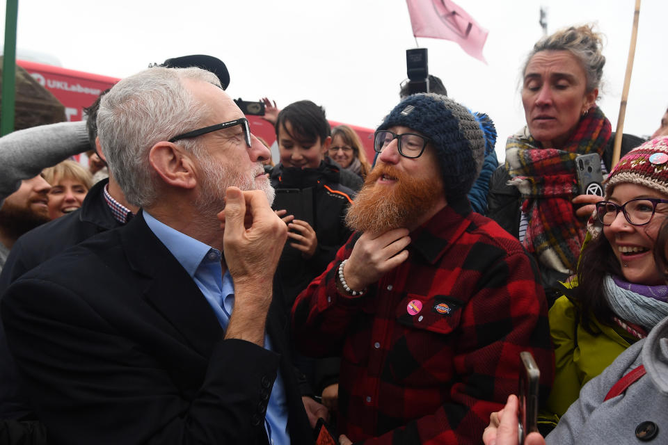 Labour Party leader Jeremy Corbyn compares beards with a supporter during a visit to Swansea, while on the General Election campaign trail in Wales.