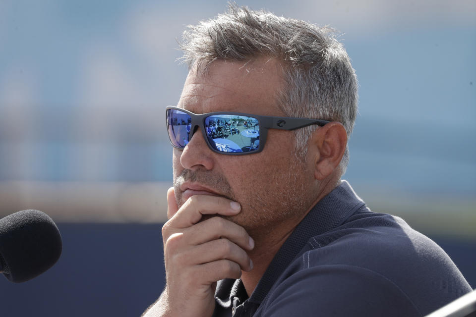 FILE - In this Feb. 12, 2020, file photo, Tampa Bay Rays manager Kevin Cash listens to a question during a news conference after pitchers and catchers reported for spring training baseball camp in Port Charlotte, Fla. (AP Photo/John Bazemore, File)