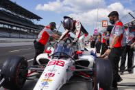 Marco Andretti climbs into his car during practice for the Indianapolis 500 auto race at Indianapolis Motor Speedway in Indianapolis, Friday, Aug. 14, 2020. (AP Photo/Michael Conroy)