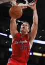 Los Angeles Clippers' Blake Griffin dunks the ball against the Los Angeles Clippers during the first half of an NBA preseason basketball game in Los Angeles on Monday, Dec. 19, 2010. (AP Photo/Danny Moloshok)