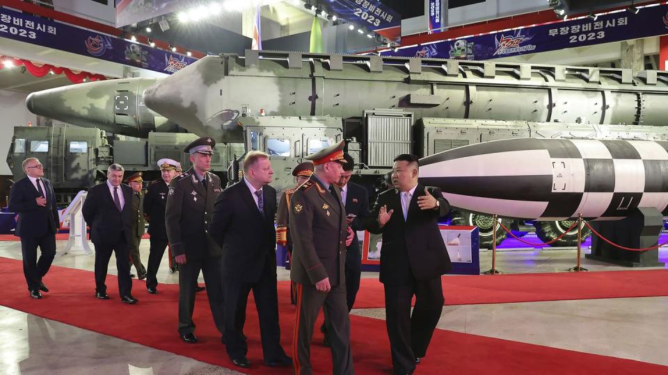 In this photo provided by the North Korean government, North Korean leader Kim Jong Un, right, with Russian delegation led by its Defense Minister Sergei Shoigu visits an arms exhibition in Pyongyang, North Korea Wednesday, July 26, 2023, on the occasion of the 70th anniversary of the armistice that halted fighting in the 1950-53 Korean War. (Korean Central News Agency/Korea News Service via AP)