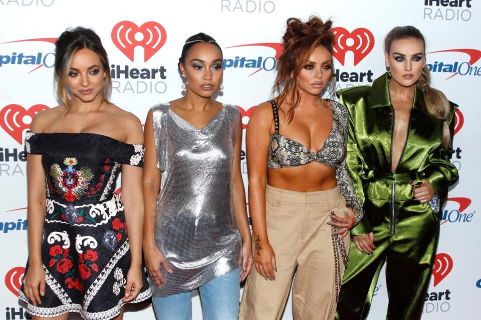 Taken ill: Little Mix were forced to perform as a three-piece as Perrie Edwards (far right) was rushed to hospital: PA