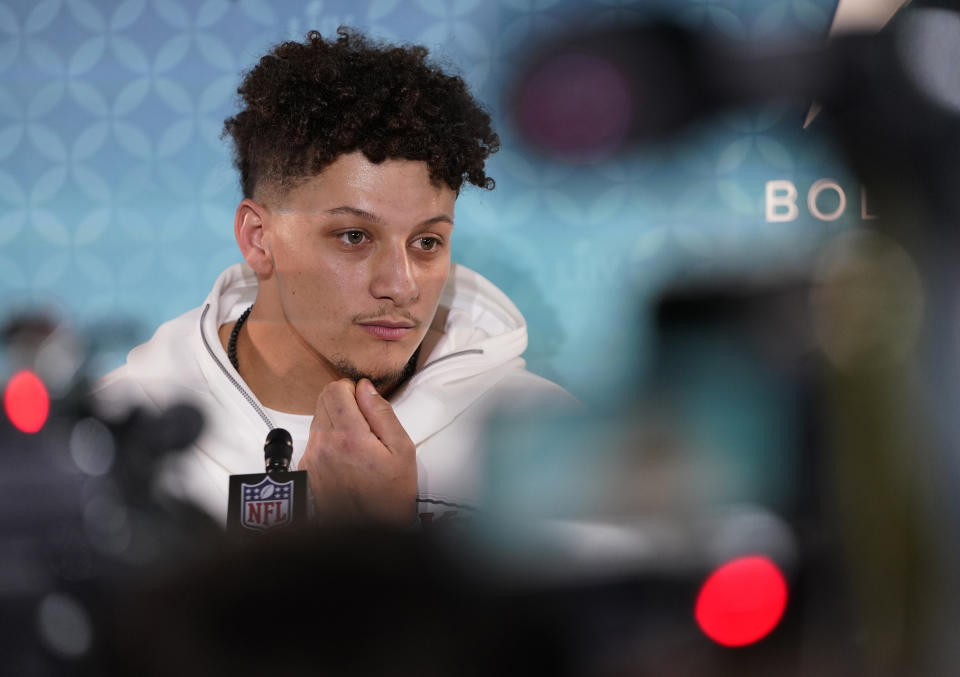 Kansas City Chiefs' Patrick Mahomes speaks to reporters during Opening Night for the NFL Super Bowl 54 football game Monday, Jan. 27, 2020, at Marlins Park in Miami. (AP Photo/David J. Phillip)