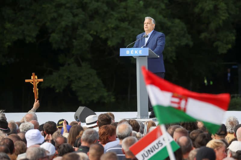 Supporters of the Hungarian ruling party march ahead of EU elections, in Budapest