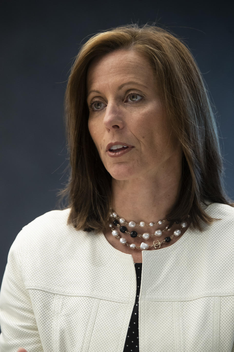 In this Wednesday, July 31, 2019, photo NASDAQ President and Chief Executive Officer Adena Friedman speaks during an interview at NASDAQ headquarters in New York. The U.S. stock market has thousands fewer companies to choose from, and that’s doing a disservice to regular investors, says Friedman. In a recent conversation with the AP, she discussed what’s behind the trend and how it could be exacerbating income inequality. (AP Photo/Mary Altaffer)