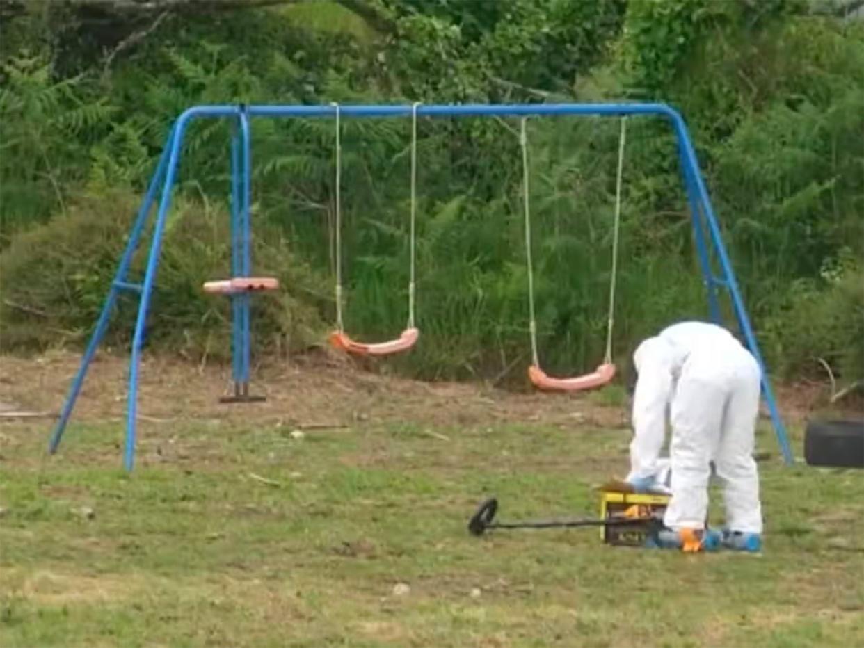 Forensics seen at the scene where the 11-year-old British girl was shot dead in her garden in Brittany, France (TF1)