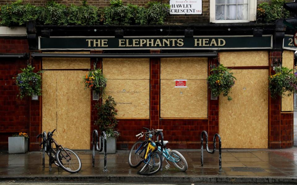 Closed pub - Matt Dunham /AP