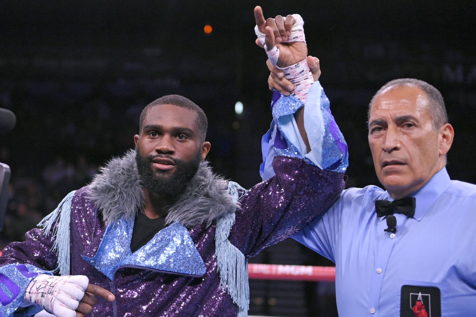 Jaron Ennis celebrates his first-round knockout of Thomas Dulorme, of Puerto Rico, in a welterweight boxing match Saturday, Oct. 30, 2021, in Las Vegas. (AP Photo/David Becker)