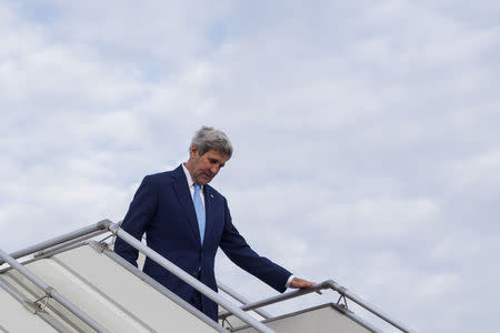 U.S. Secretary of State John Kerry disembarks from his plane upon arrival at Chinggis Khaan International Airport in Ulaanbaatar, Mongolia, June 5, 2016. REUTERS/Saul Loeb/Pool