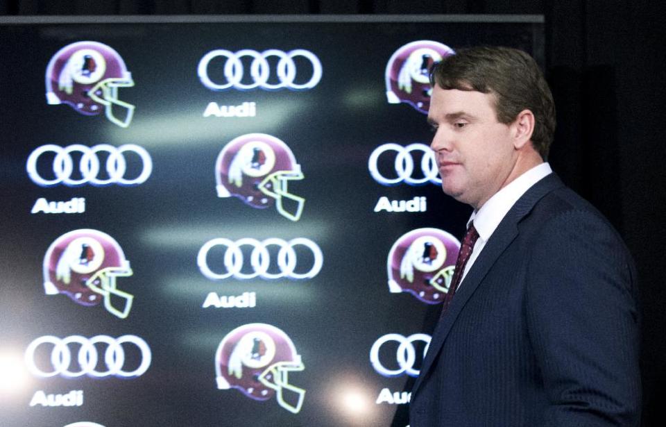 New Washington Redskins head coach Jay Gruden, arrives for a news conference at the Redskins Park in Ashburn, Va., Thursday, Jan. 9, 2014. Jay Gruden was introduced Thursday as the new Washington Redskins head coach, replacing Mike Shanahan and becoming the team’s eighth head coach since Daniel Snyder purchased the franchise in 1999. (AP Photo/Manuel Balce Ceneta)