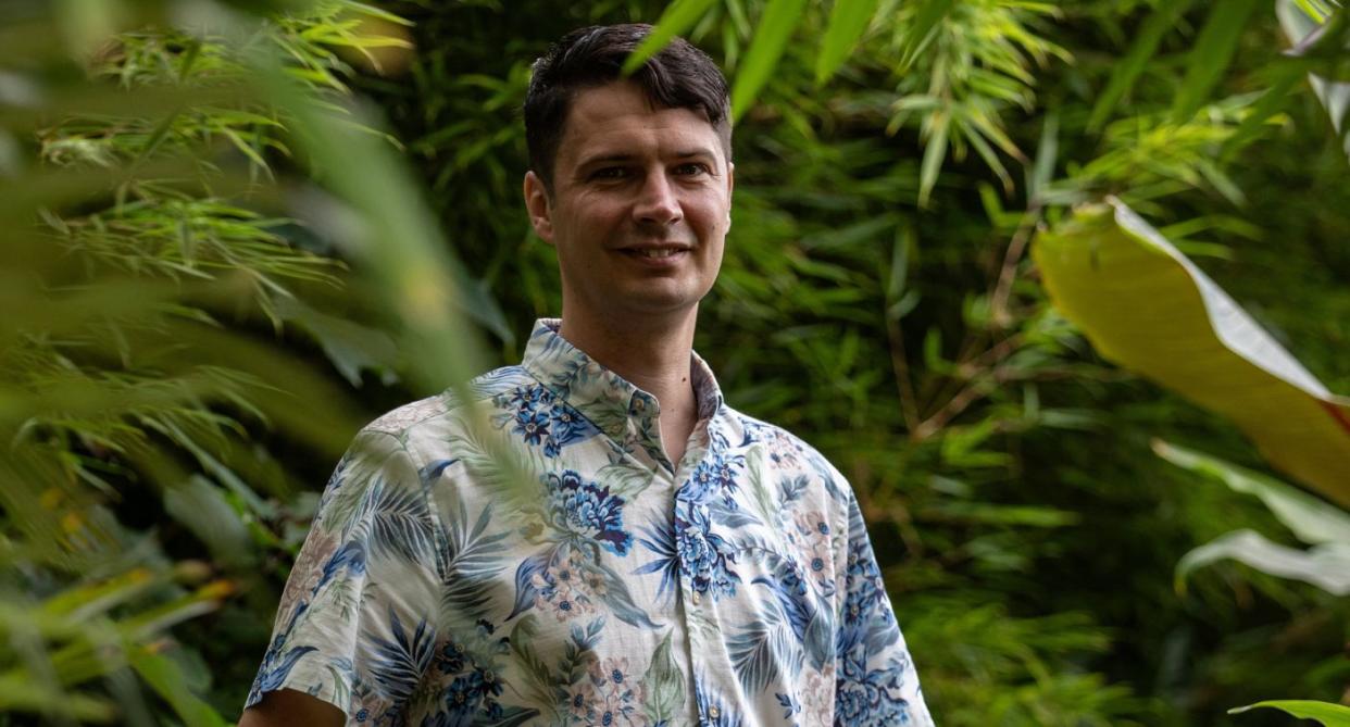 Kris Swaine in his tropical garden. (SWNS)