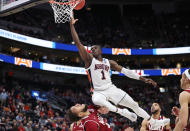 <p>Jared Harper #1 of the Auburn Tigers drives to the basket during the first half against the New Mexico State Aggies in the first round of the 2019 NCAA Men’s Basketball Tournament at Vivint Smart Home Arena on March 21, 2019 in Salt Lake City, Utah. (Photo by Patrick Smith/Getty Images) </p>