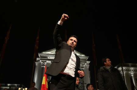 The leader of the opposition Social Democratic Union of Macedonia (SDSM) Zoran Zaev celebrates with supporters during parliamentary elections in Skopje, Macedonia, December 11, 2016. REUTERS/Stoyan Nenov