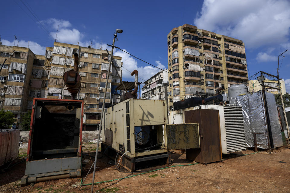 A row of privately-owned diesel generators provide power to homes and businesses in Beirut, Lebanon, March 4, 2022. Private generators are ubiquitous in parts of the Middle East, spewing hazardous fumes into homes and business across the country, almost 24 hours a day. As the world looks for renewable energy to tackle climate change, Lebanon, Iraq, Gaza and elsewhere rely on diesel-powered private generators just to keep the lights on. The reason is state failure: In multiple countries, governments can’t maintain a functioning central power network, whether because of war, conflict or mismanagement and corruption. (AP Photo/Hassan Ammar)