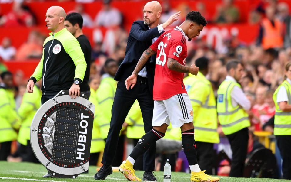 Erik ten Hag, manager of Manchester United interacts with Jadon Sancho - Jack Grealish is Manchester United's sliding doors moment as Jadon Sancho remains out in the cold