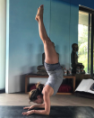 <p>The petite actress sure makes this balancing act look easy, but she’s not hiding the truth: “#Namaste #Yoga #DamnThisIsHard.” (Photo: Courtesy Eva Longoria via Instagram) </p>