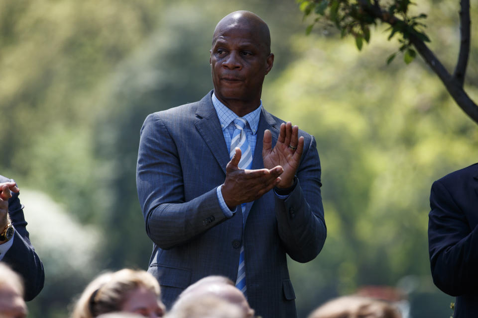 Former baseball player Darryl Strawberry applauds as President Trump speaks during a "National Day of Prayer" event in the Rose Garden of the White House, May 3, 2018. (AP Photo/Evan Vucci)