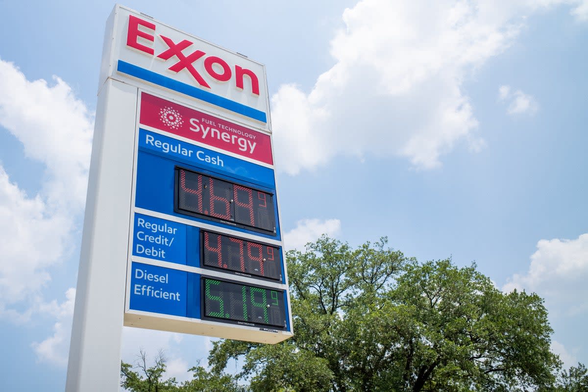 Gas prices are seen on an Exxon Mobil gas station sign on 9 June 2022 in Houston, Texas (Getty Images)