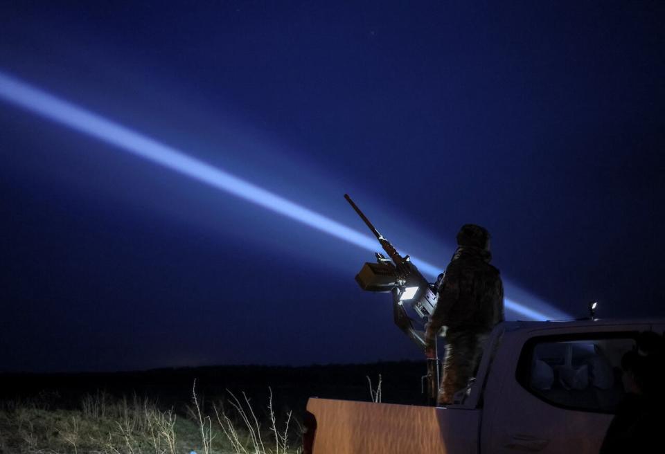 A Ukrainian serviceman from anti-drone mobile air defence unit operates a Browning machine gun at his position, amid Russia's attack on Ukraine, in Chernihiv region, Ukraine March 28, 2024.