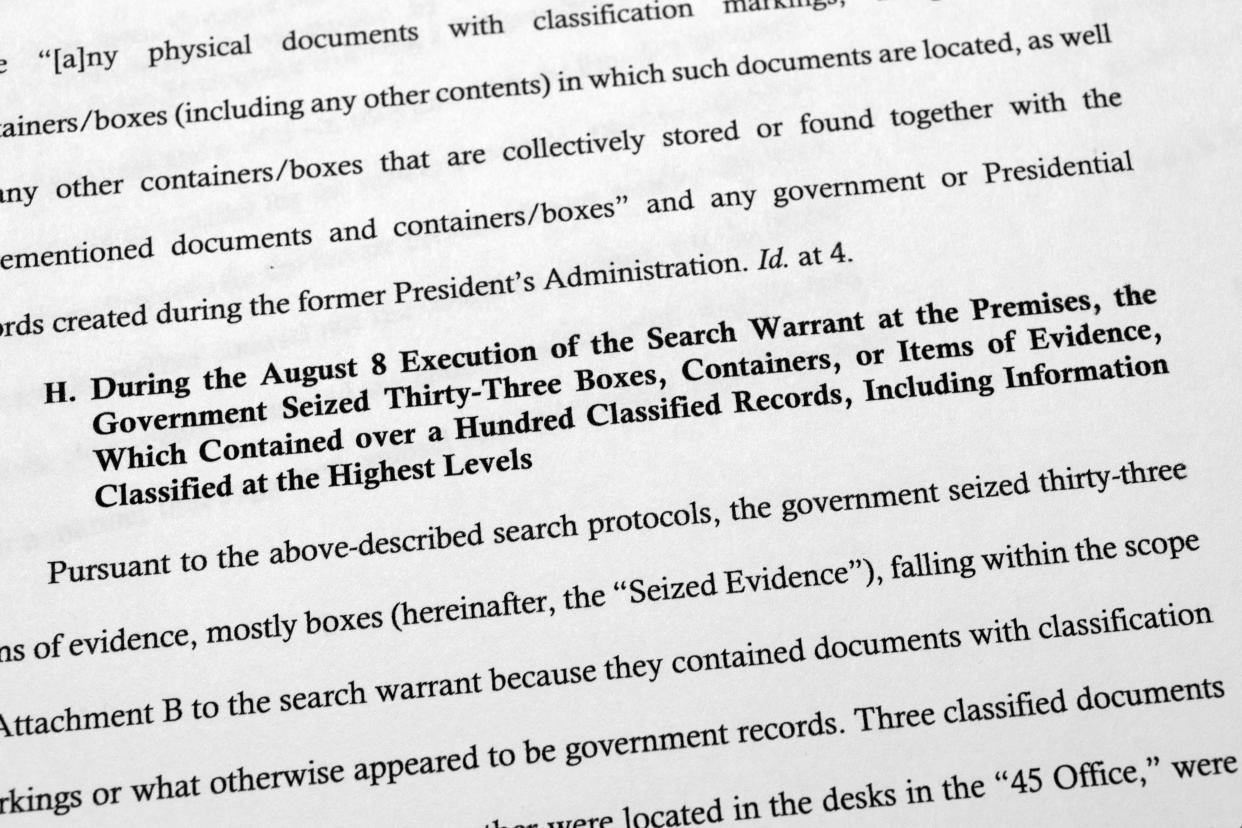 Pages from a Department of Justice court filing on Aug. 30, 2022, in response to a request from the legal team of former President Donald Trump for a special master to review the documents seized during the Aug. 8 search of Mar-a-Lago, are photographed early Wednesday, Aug. 31, 2022. 