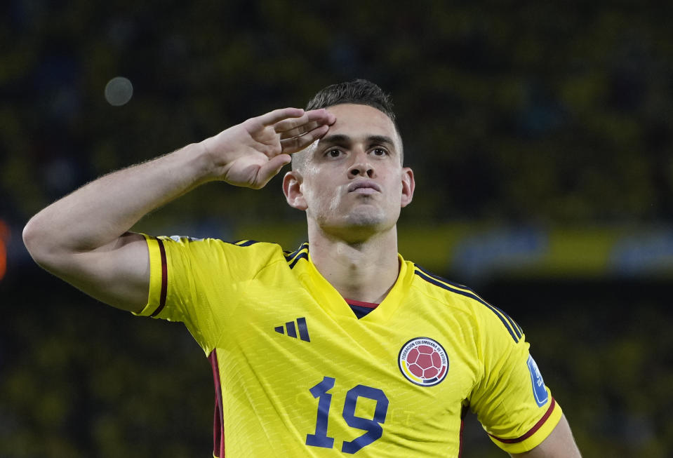 Colombia's Rafael Santos Borre celebrates scoring his side's opening goal against Venezuela during a qualifying soccer match for the FIFA World Cup 2026 at Metropolitano stadium in Barranquilla, Colombia, Thursday, Sept. 7, 2023. (AP Photo/Ricardo Mazalan)