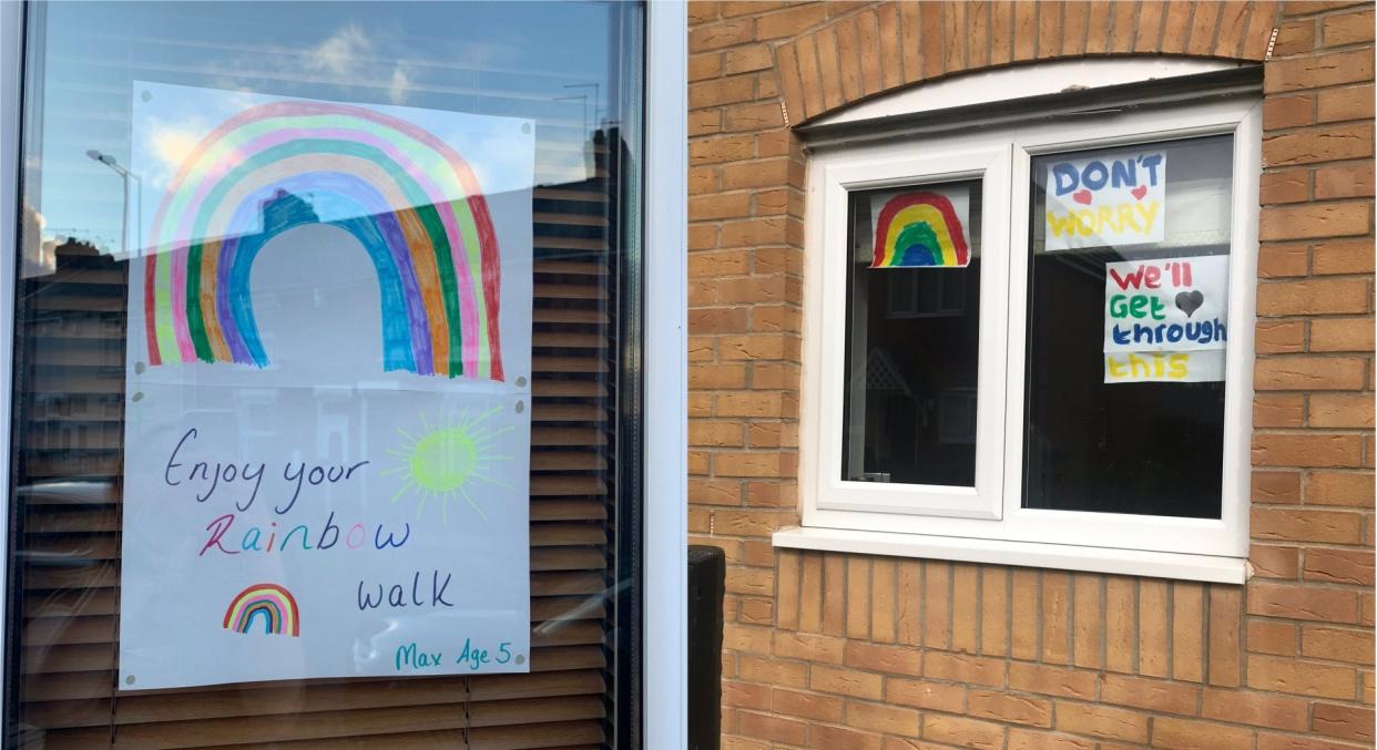 Children are painting rainbows to put in their windows to raise the spirits of passers-by (PA)