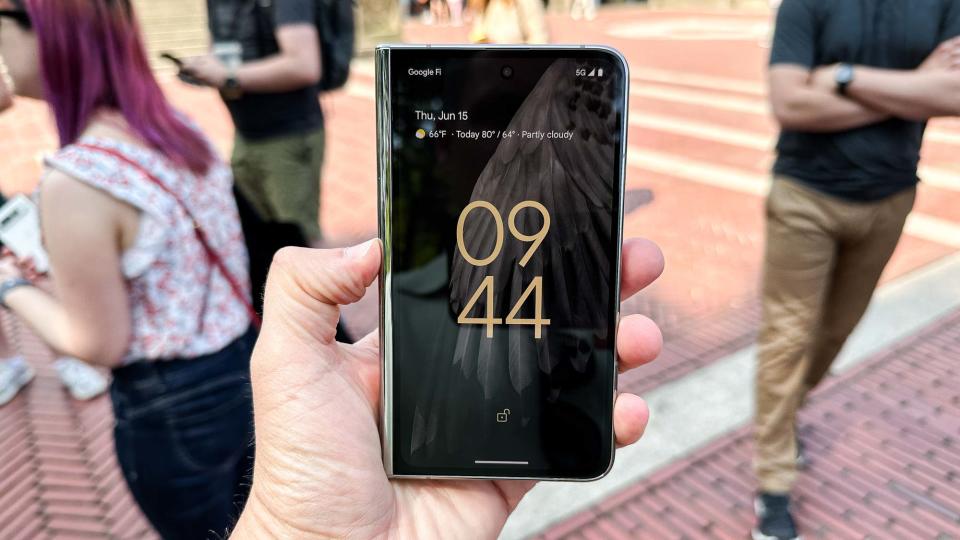 Google Pixel Fold shown in hand