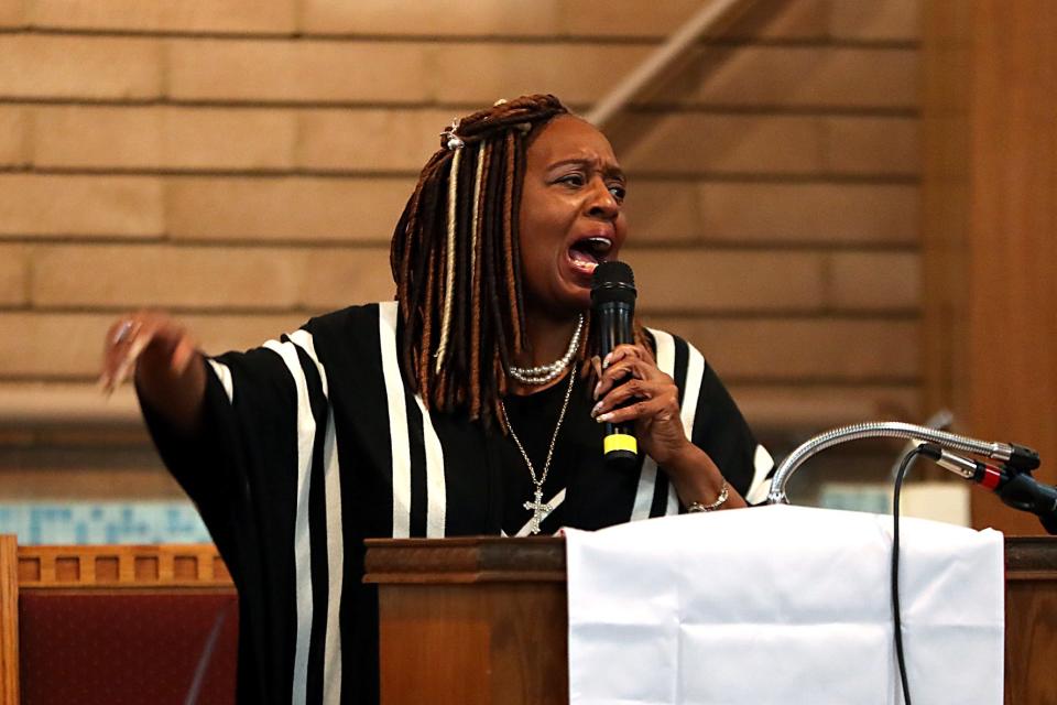 Rev. Mercedes Tudy-Hamilton preaches during an event to honor Dr. Martin Luther King, Jr at First Community Baptist Church in Desert Hot Springs, Calif., on Monday, Jan. 17, 2022.