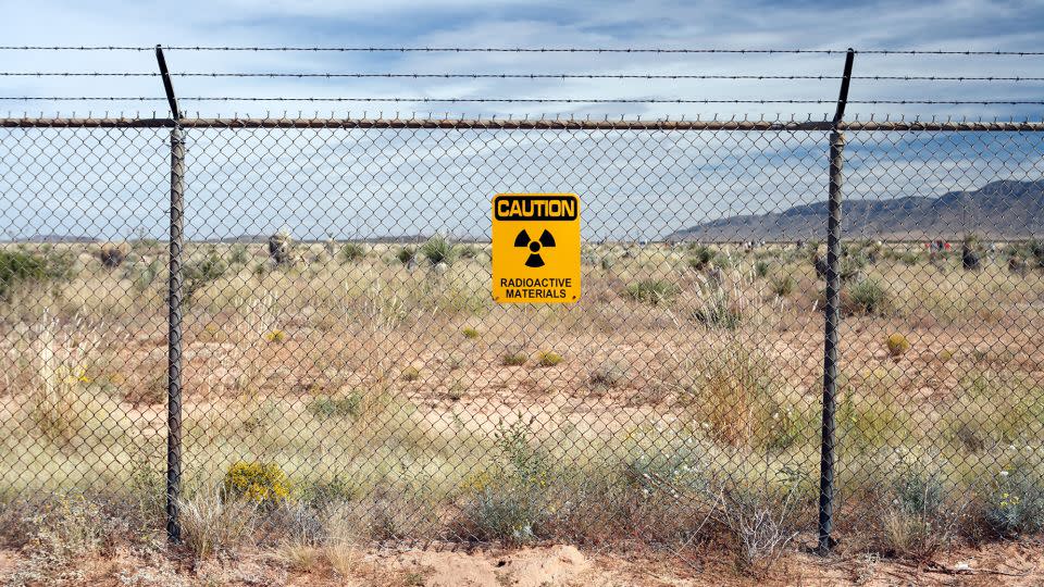 A caution sign warns of radioactive materials at Trinity Site in New Mexico back in 2008. - Jonathan Larsen/Diadem Images/Alamy Stock Photo