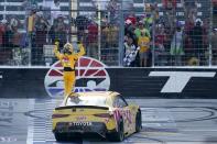 Kyle Busch celebrates after winning a NASCAR Xfinity Series auto race at Texas Motor Speedway in Fort Worth, Texas, Saturday, June 12, 2021. (AP Photo/Tony Gutierrez)