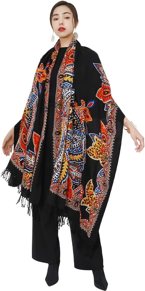 model wearing black and floral big scarf