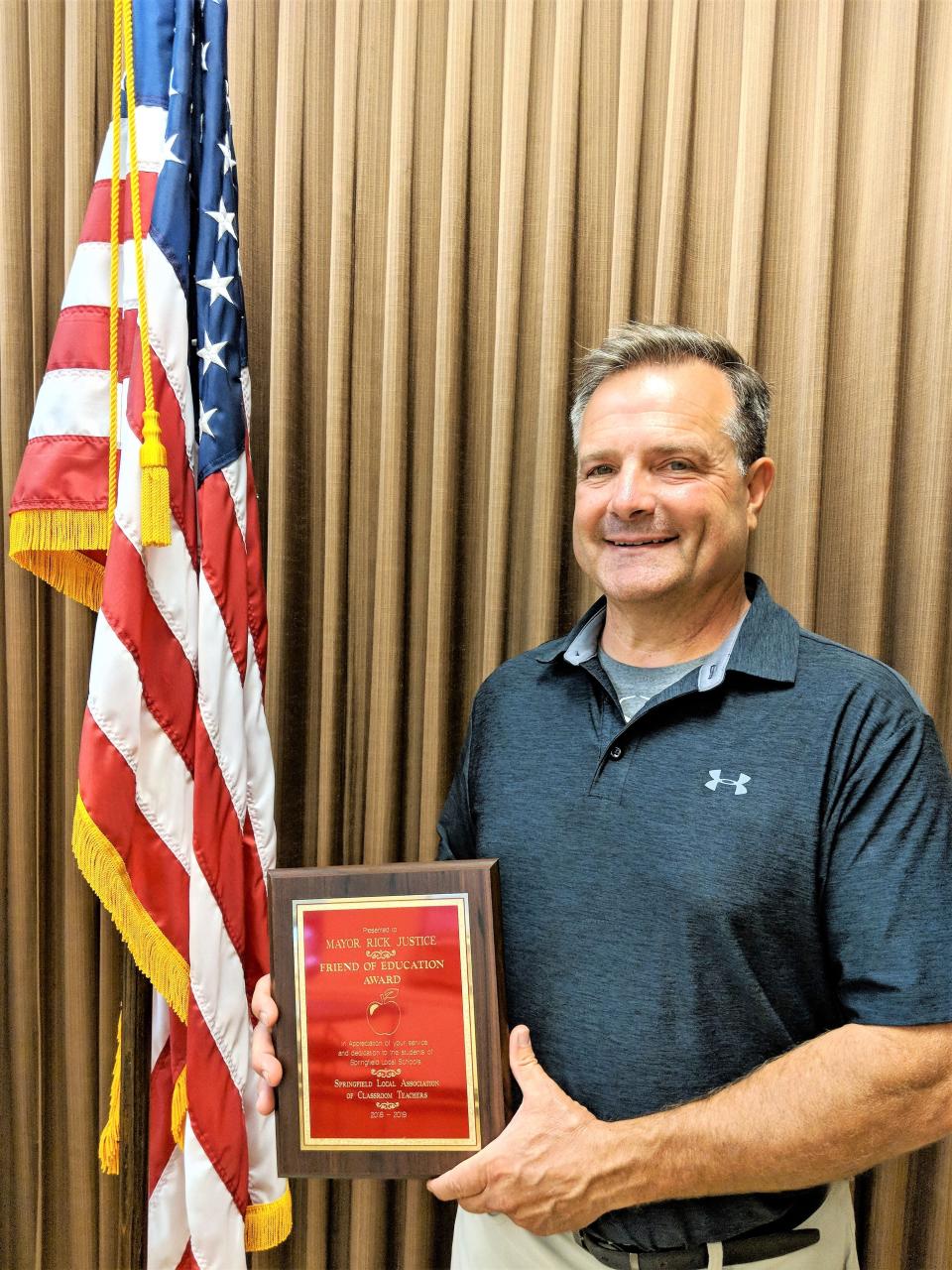 Lakemore Mayor Rick Justice was awarded Springfield Local Schools' Friend of Education award. (Suburbanite Carolynn Mostyn)