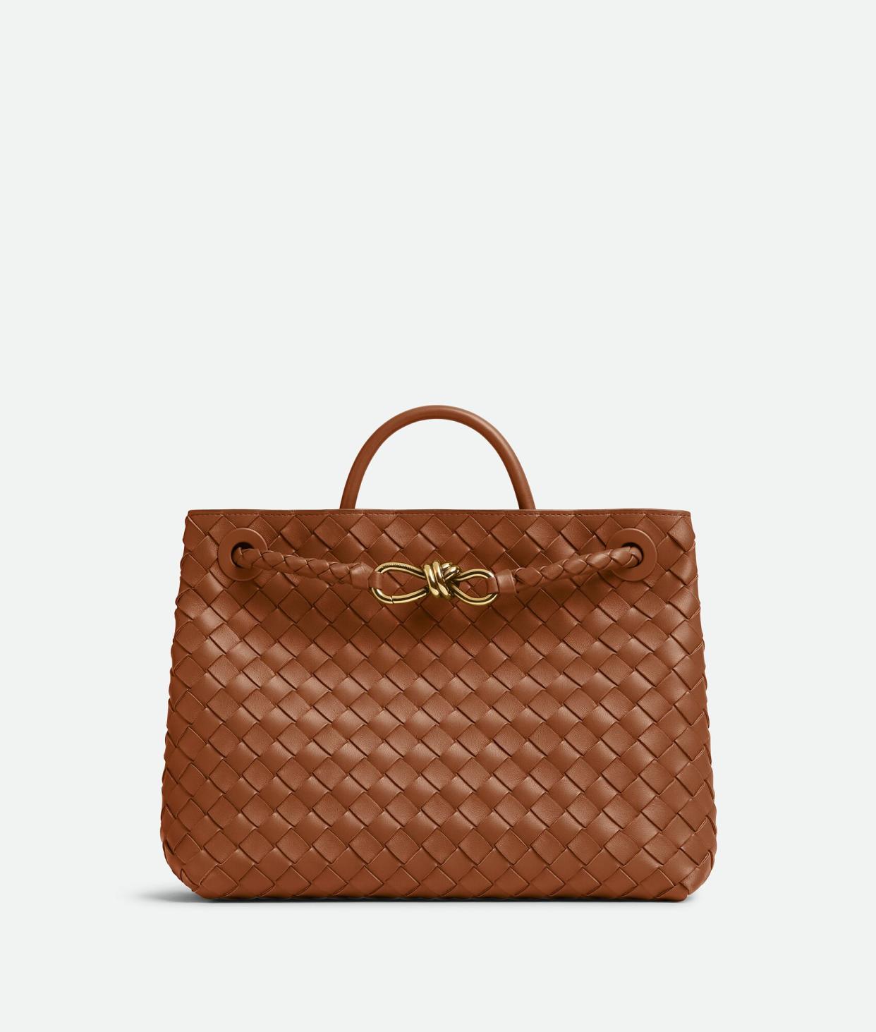 <p><a href="https://go.redirectingat.com?id=74968X1596630&url=https%3A%2F%2Fwww.bottegaveneta.com%2Fen-us%2Fmedium-andiamo-cognac-766016VCPP12598.html%3Fdwvar_766016VCPP12598_color%3D2598&sref=https%3A%2F%2Fwww.veranda.com%2Fshopping%2Fg60333759%2Fbest-travel-tote-bags%2F" rel="nofollow noopener" target="_blank" data-ylk="slk:Shop Now;elm:context_link;itc:0;sec:content-canvas" class="link rapid-noclick-resp">Shop Now</a></p><p>Bottega Veneta Medium Andiamo</p><p>bottegaveneta.com</p><p>$5100.00</p>