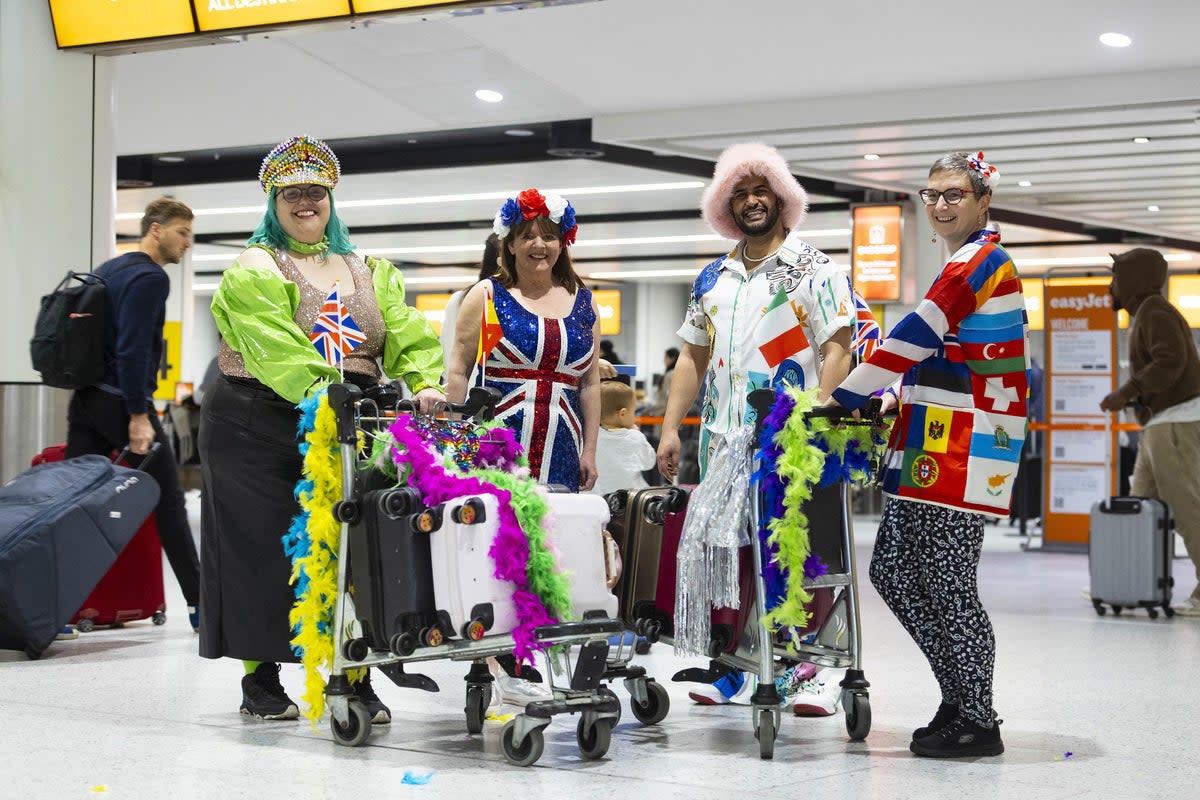 Eurovision fans prepare to board a special party flight from Gatwick (David Parry/PA) (PA Wire)