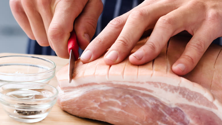 scoring raw pork roast