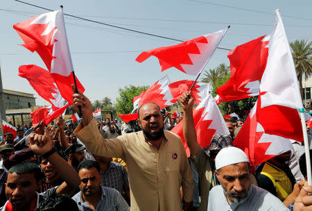 Supporters of Iraqi Shi'ite cleric Moqtada al-Sadr shout slogans during a demonstration in front of the Bahraini embassy in Baghdad, Iraq May 24, 2017. REUTERS/Wissm al-Okili