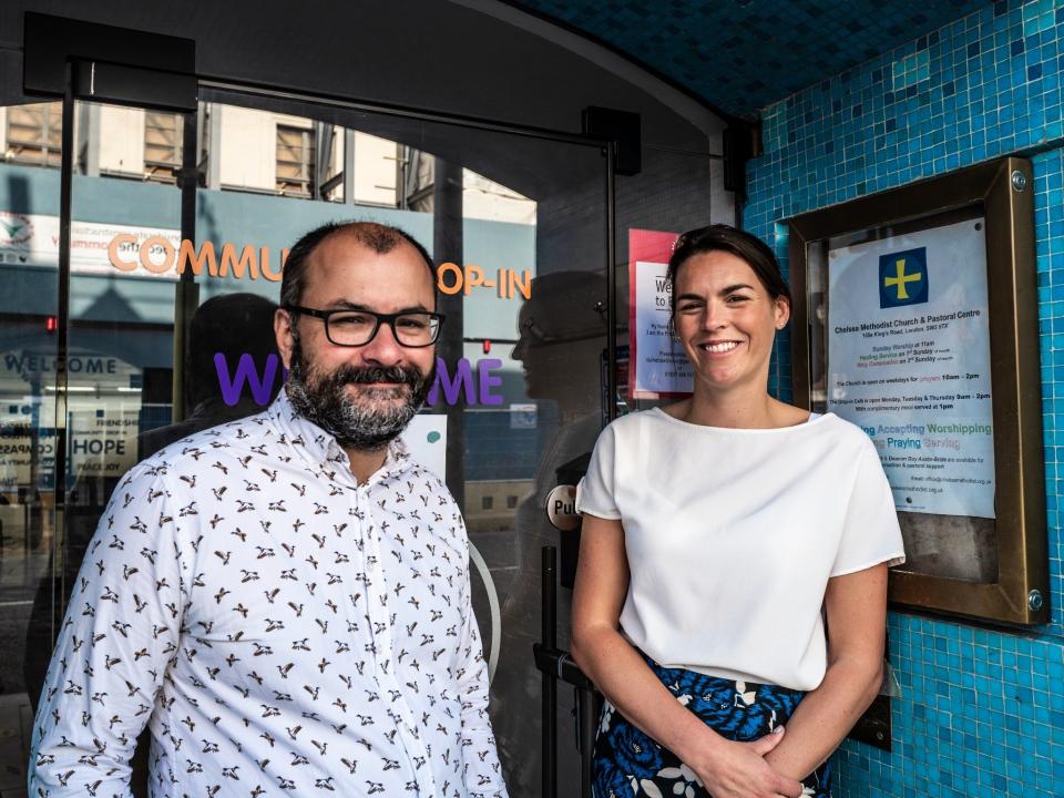 Glass Door CEO Lucy Abraham meets with StreetSmart's Glenn Pougnet in front of the Chelsea Methodist Church, which houses Glass Door's main headquarters and also is home to a drop-in community centre that partners with Glass Door (Lisa Tse)