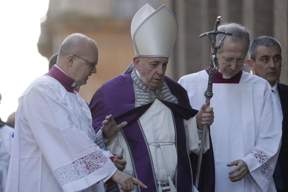 Pope Francis walks in procession to the Basilica of Santa Sabina before the Ash Wednesday Mass opening Lent, the forty-day period of abstinence and deprivation for Christians before Holy Week and Easter, in Rome, Wednesday, Feb. 26, 2020. Pope Francis is marking Ash Wednesday with prayer and a solemn procession between two churches on one of ancient Rome's seven hills. (AP Photo/Gregorio Borgia)