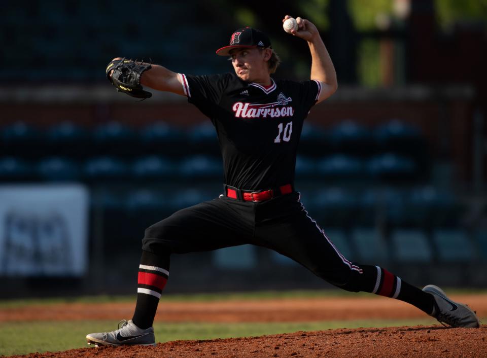 Harrison's Levi Thomas (10) delivers a pitch to a Castle batter during their sectional semifinal game at Bosse Field Friday evening, May 26, 2023.