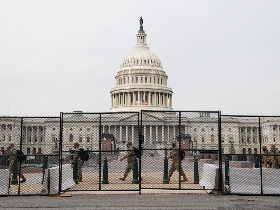 <p>Security fencing surrounds the US Capitol days after supporters of US President Donald Trump stormed the Capitol in Washington, US</p> (REUTERS)