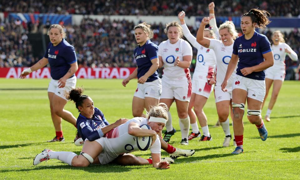 <span>Alex Matthews scores the Red Roses’ second try of the match to propel them towards another title.</span><span>Photograph: David Rogers/Getty Images</span>