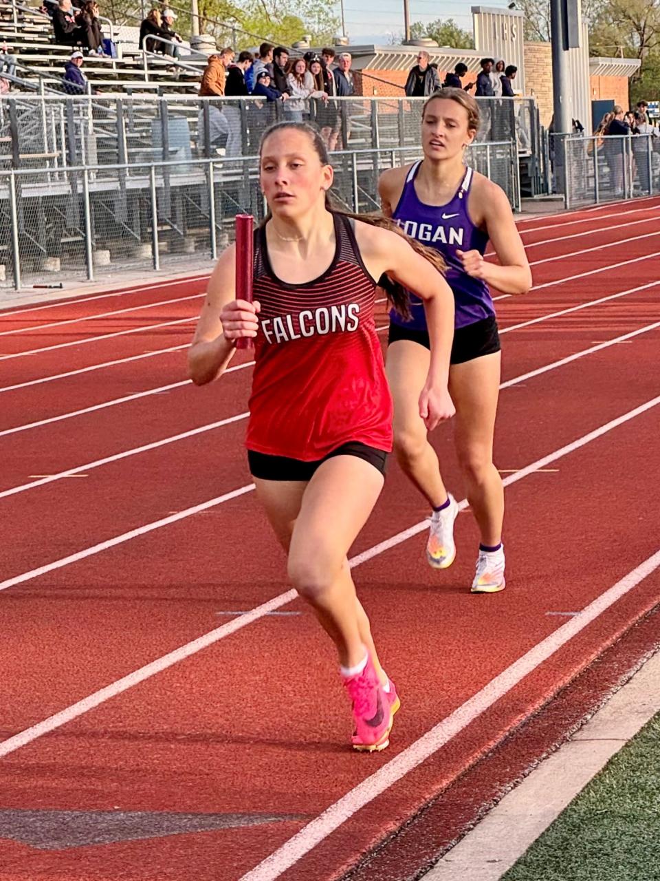 Fairfield Union's Abigail Pike runs a relay during the Lancaster Fulton Relays. The Falcons are having an outstanding season and have four out of six meets they have competed in.