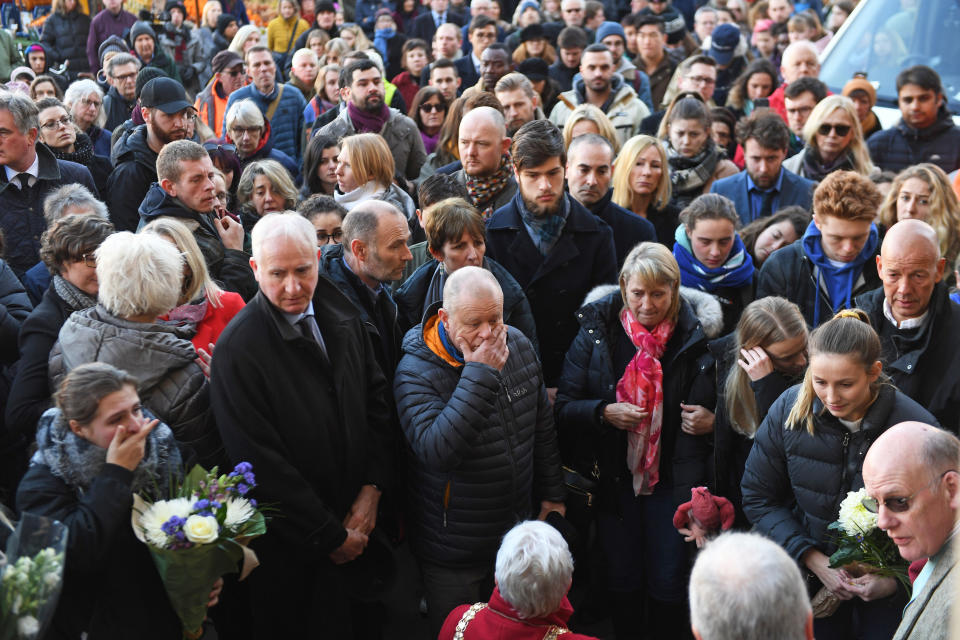 Jack Merrit's father (centre) attends a vigil at The Guildhall in Cambridge to honour both him and Saskia Jones after they were killed in Friday's London Bridge terror attack.