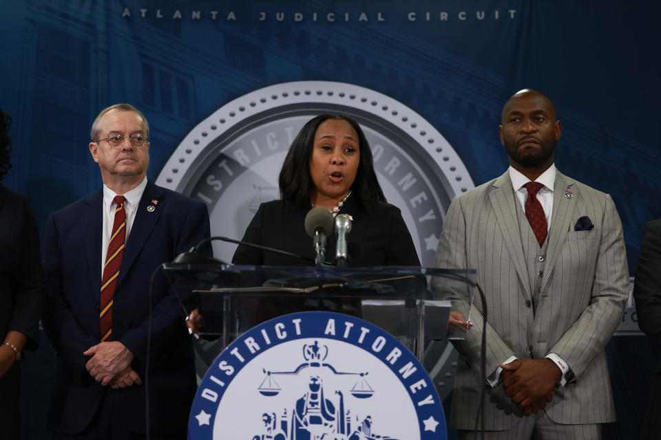 File: Fulton County District Attorney Fani Willis (center); special prosecutor Nathan Wade (right), on Aug. 14, 2023, in Atlanta, Georgia.  / Credit: Joe Raedle/Getty Images